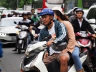 Мотоциклисты в Хошимине. Motorcyclists in Ho Chi Minh City (HCMC).